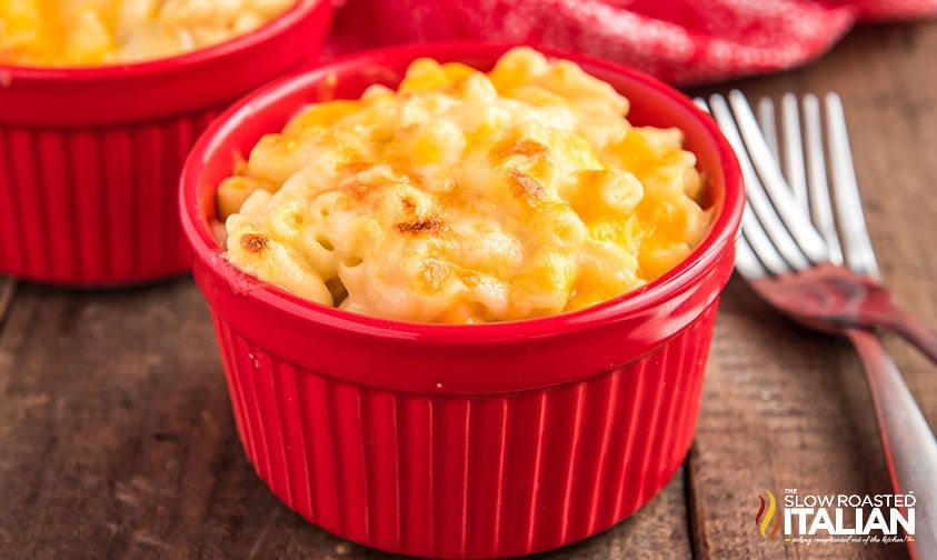 broiled mac and cheese in small, red ramekins