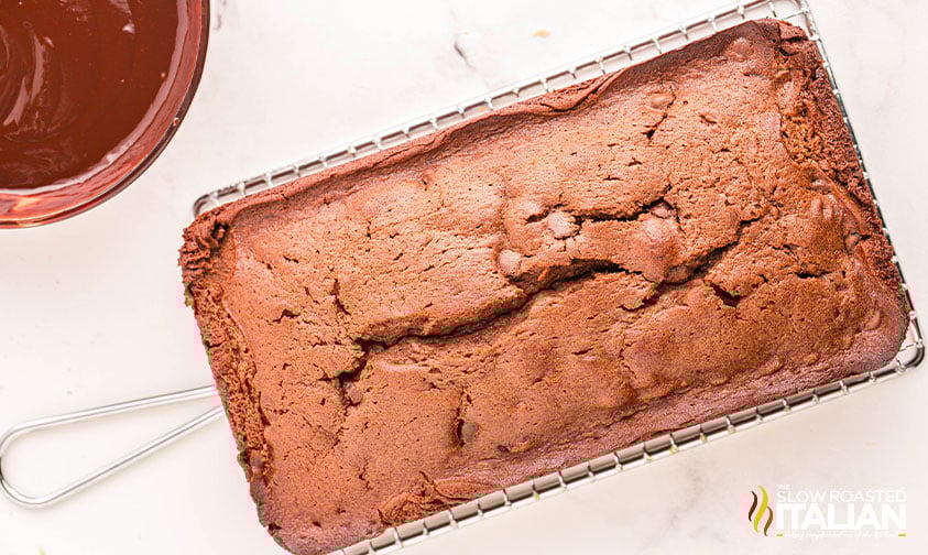 baked chocolate pound cake on a cooling rack