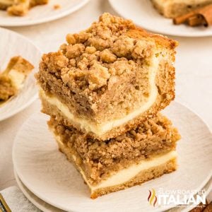 two stacked pieces of cream cheese coffee cake