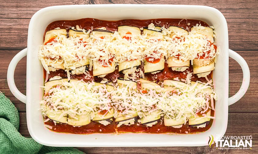eggplant rollatini topped with shredded cheese