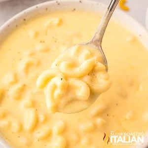 closeup of a spoonful of one pot mac and cheese soup