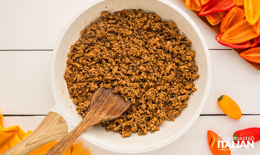 browned beef with seasoning in a large skillet