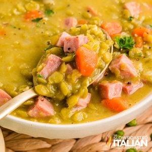 closeup of a spoonful of split pea and ham soup