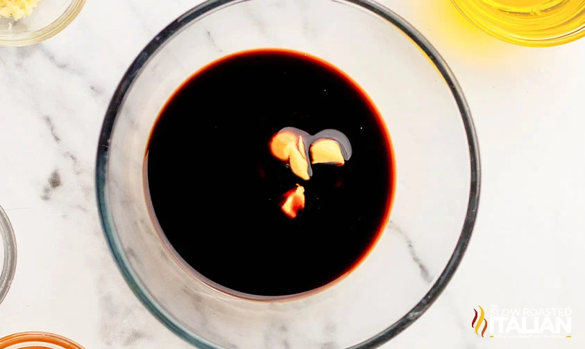 balsamic vinegar and Dijon mustard in mixing bowl