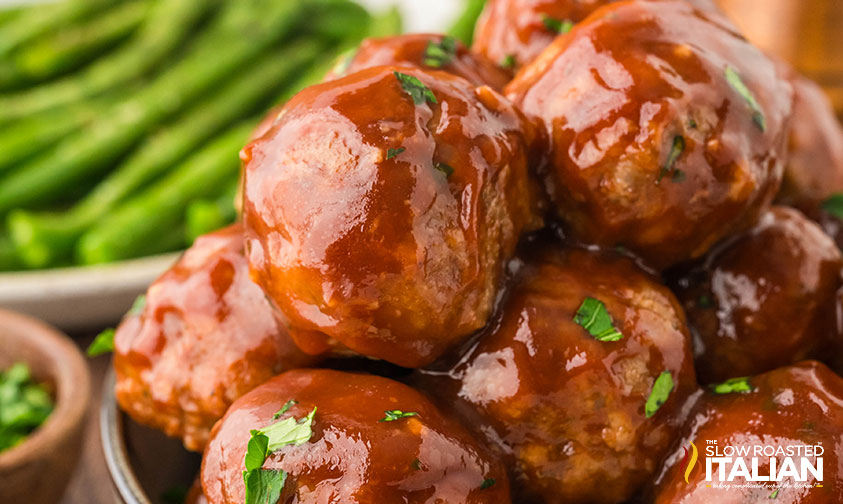 closeup of meatloaf meatballs covered in balsamic sauce