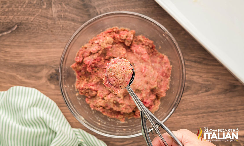 scooping a meatloaf meatball with a cookie scoop
