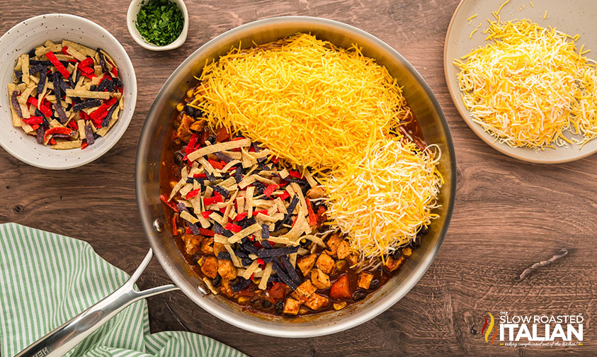 shredded cheese added to chicken enchilada skillet