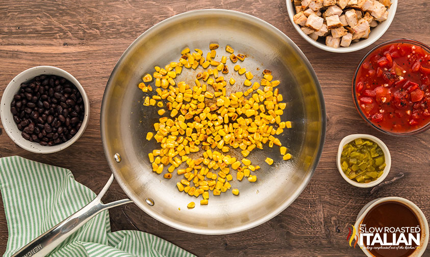cooked corn in a skillet for chicken enchilada skillet recipe