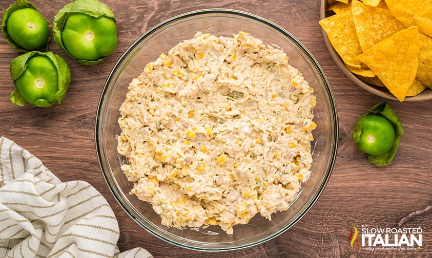 mixed chicken enchilada dip ingredients in a bowl