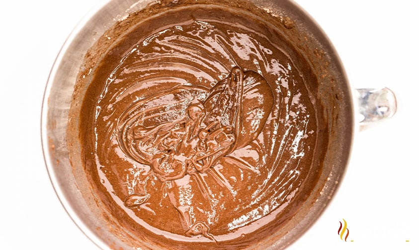 mixed batter for chocolate dr pepper cake in a large bowl