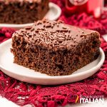 a slice of chocolate dr pepper cake on a white plate