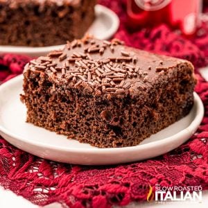 a slice of chocolate dr pepper cake on a white plate