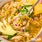 closeup of salsa verde chicken soup in a bowl