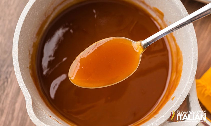 making sweet and sour sauce for meatballs