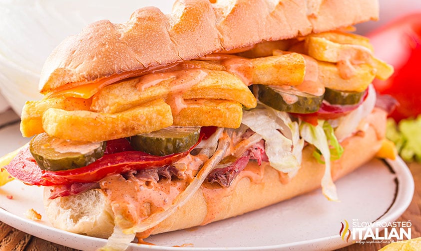 gatsby sandwich on a white plate