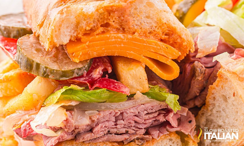 closeup of loaded gatsby sandwich sliced in half