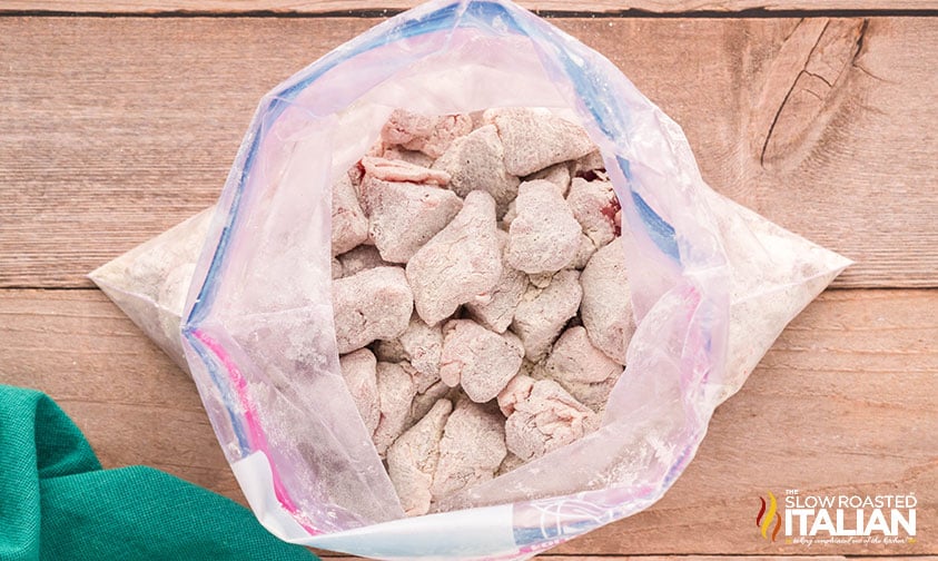 pork stew meat covered in seasoned flour