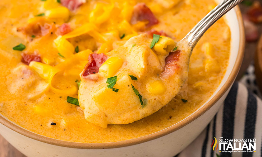 closeup of chicken bacon corn chowder on a spoon