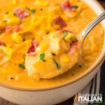 closeup of chicken bacon corn chowder on a spoon