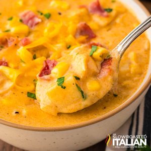 closeup of chicken bacon corn chowder on a spoon