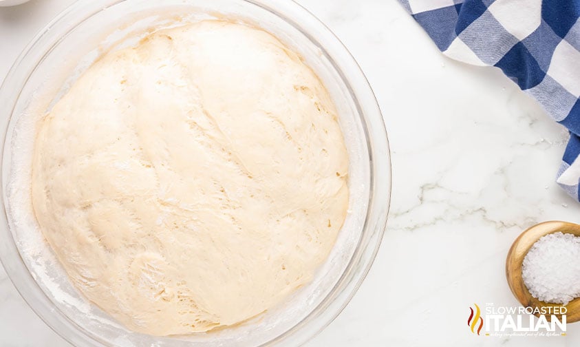 dough for soft pretzels in a large bowl