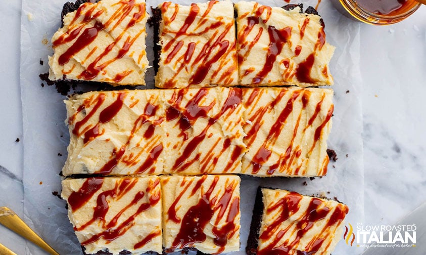 top view of guinness chocolate cake sliced and drizzled with caramel sauce