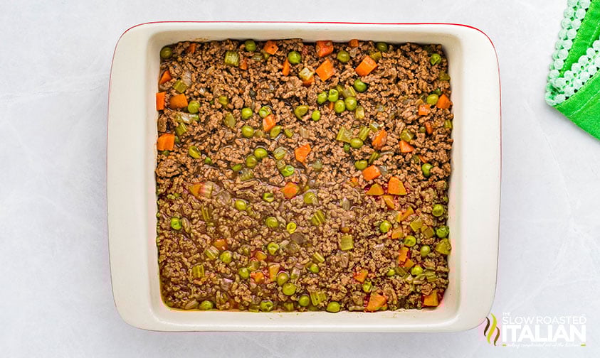 beef filling for guinness shepherd's pie in a baking dish