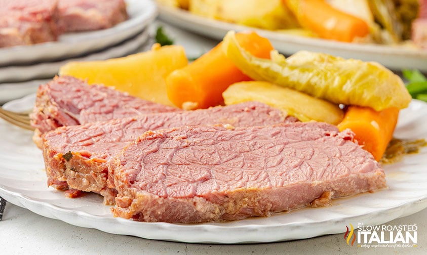 sliced instant pot corned beef and cabbage on a plate