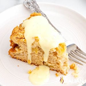 a slice of irish apple cake on a white plate