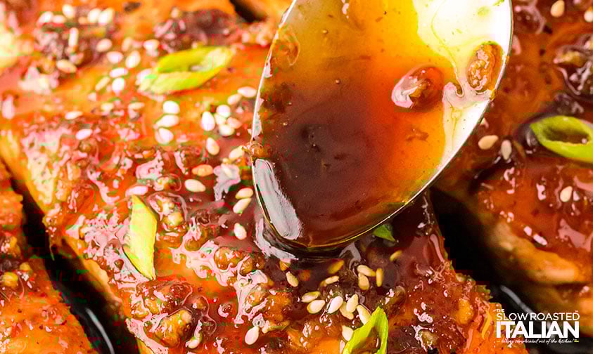 drizzling sauce over sticky salmon recipe