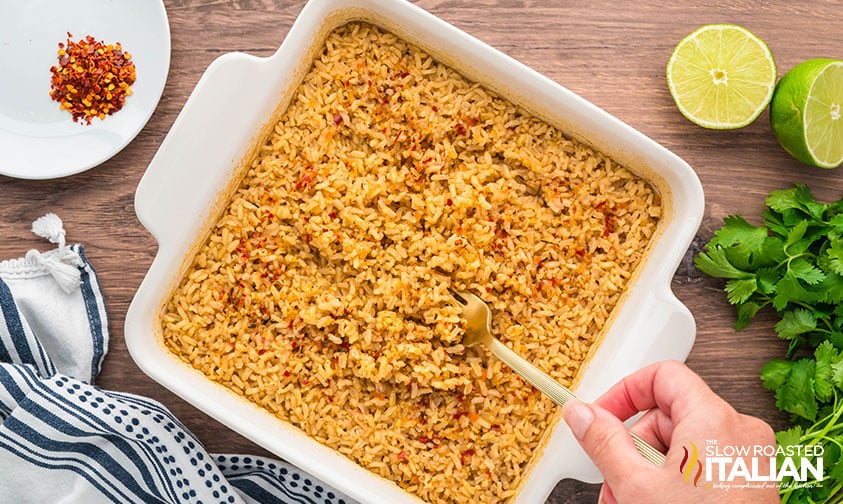 spicy rice baked in a white baking dish