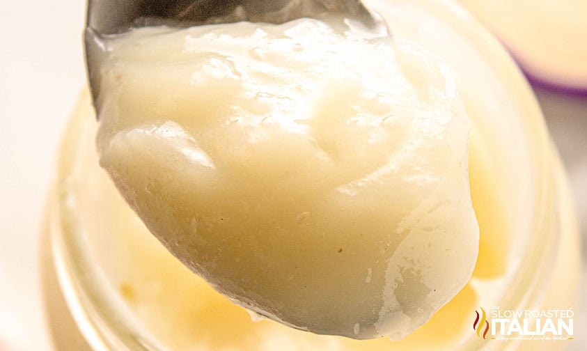 closeup of beef tallow on a spoon