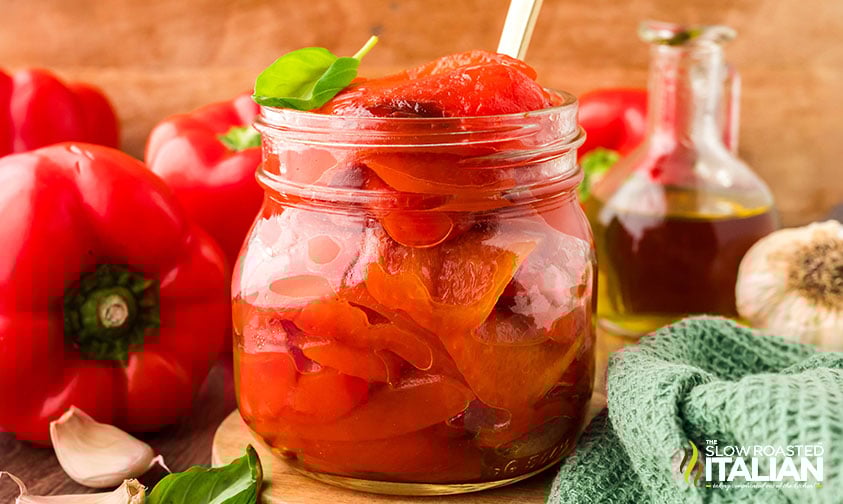 glass jar full of roasted red peppers