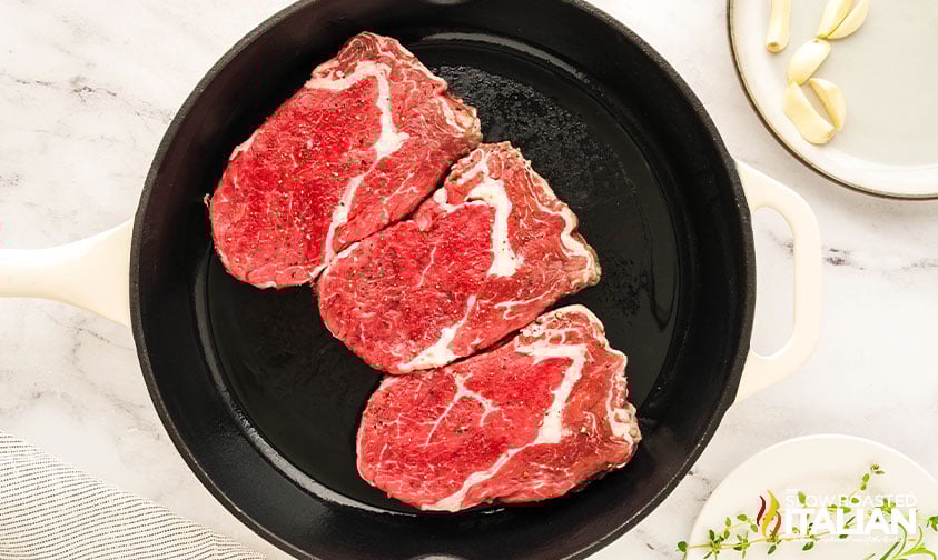 boneless steak in a cast iron skillet