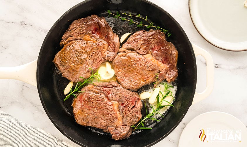 seared boneless steak in a cast iron skillet