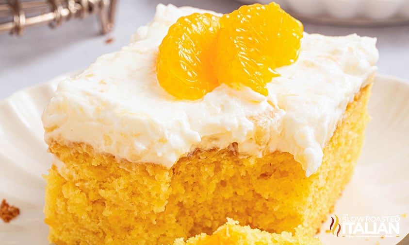 closeup of of pig pickin cake topped with orange slices