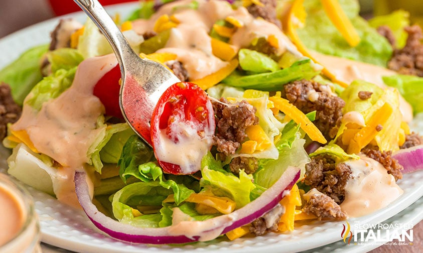 big mac salad with ground beef, lettuce, pickles, and special sauce