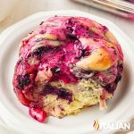 closeup of blueberry sweet rolls on a plate
