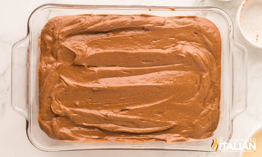 chocolate tres leches cake in a 9x13 baking dish