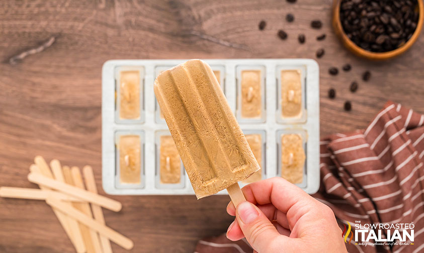 hand holding coffee popsicles