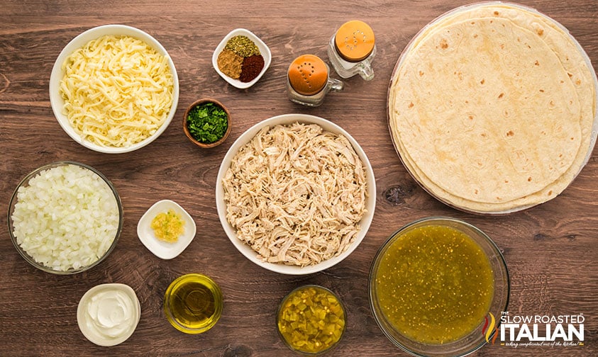 ingredients for salsa verde chicken enchiladas measured and placed in bowls