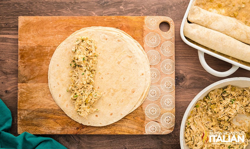salsa verde chicken enchilada filling on a tortillas
