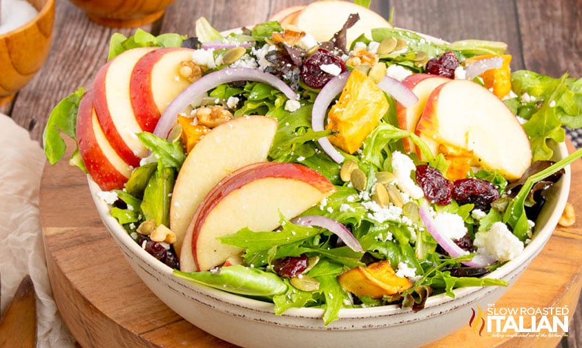 fall salad with apples, nuts, and honey vinaigrette dressing
