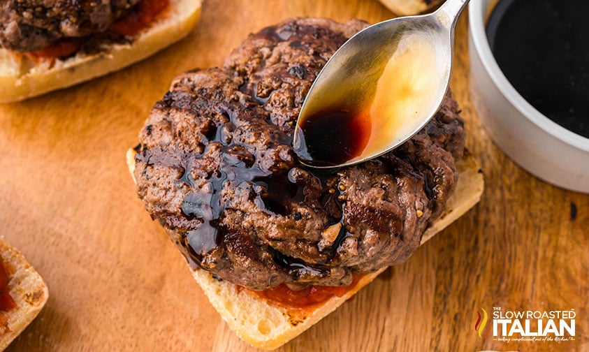 pesto burger patty on bun with balsamic reduction