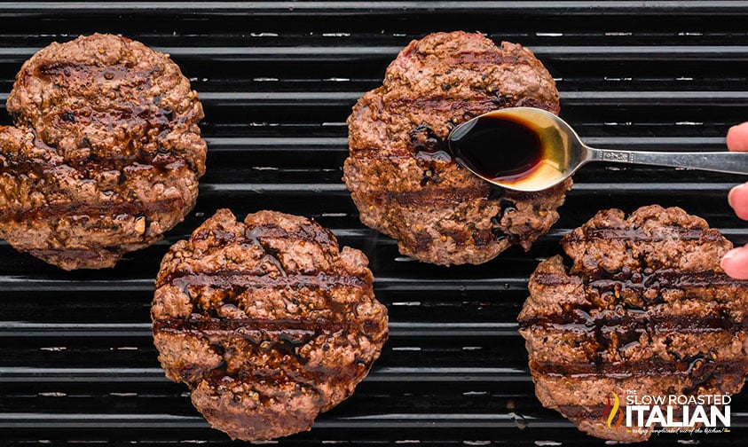 grilling patties and adding balsamic reduction for pesto burgers
