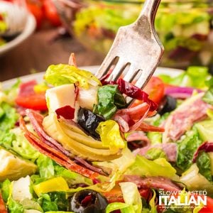 Italian chopped salad on a fork