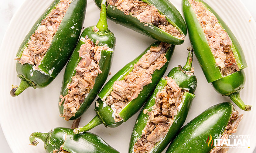 jalapenos filled with cream cheese and brisket to make texas twinkies