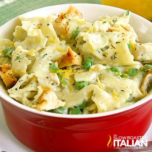 cheesy chicken pasta with peas. closeup