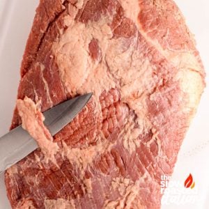 Closeup of how to trim a brisket