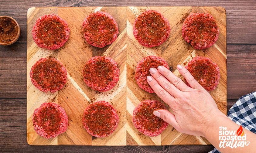 rubbing bbq sliders with spices